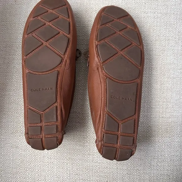 Cole Haan women’s super comfortable tan flat shoes with bow, size 10
