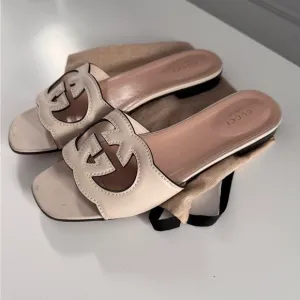 Gucci Cream Mules Sleek Design