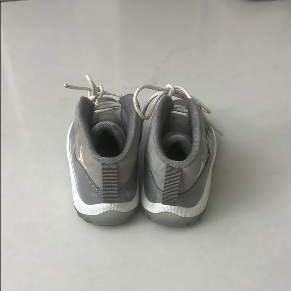 Jordan Gray and White Mid-Top Sneakers