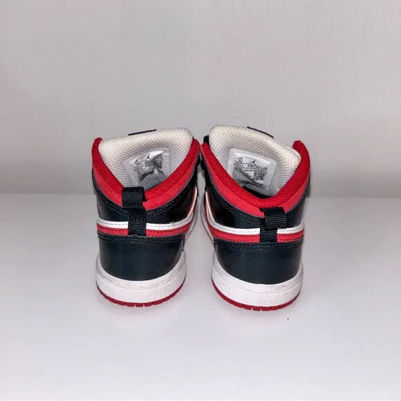 Jordan Retro High Kids Sneakers Black and Red.
