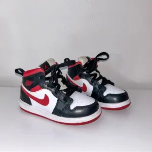 Jordan Retro High Kids Sneakers Black and Red.