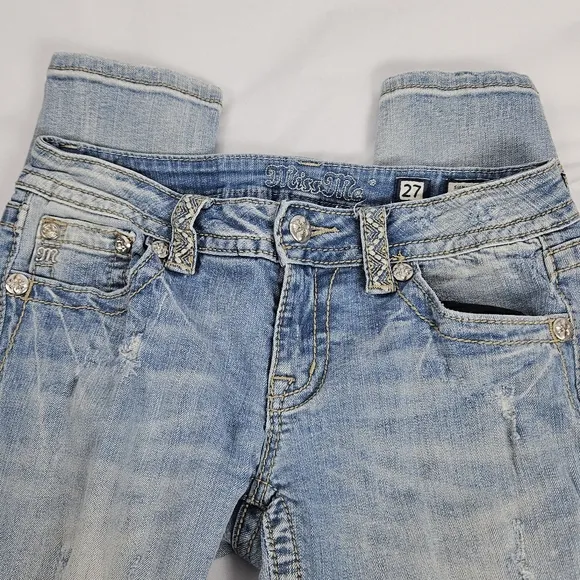 Miss Me factory distressed, rhinestone and embroidered skinny jeans size 27