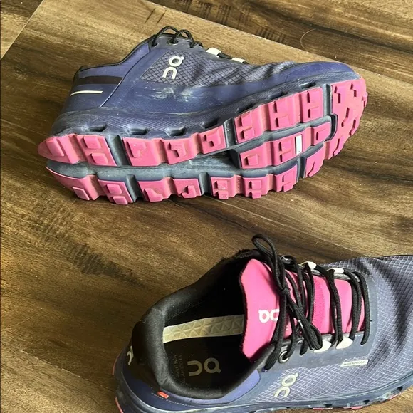On Running Purple and Pink Athletic Shoes with Cushioned Midsole