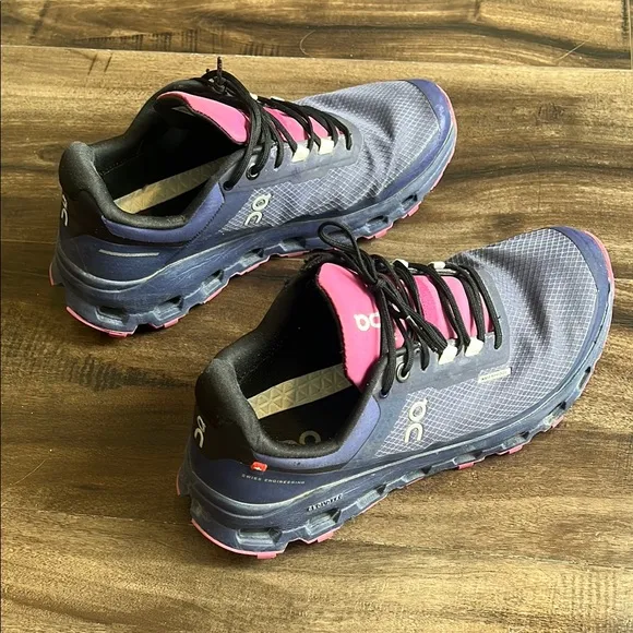 On Running Purple and Pink Athletic Shoes with Cushioned Midsole