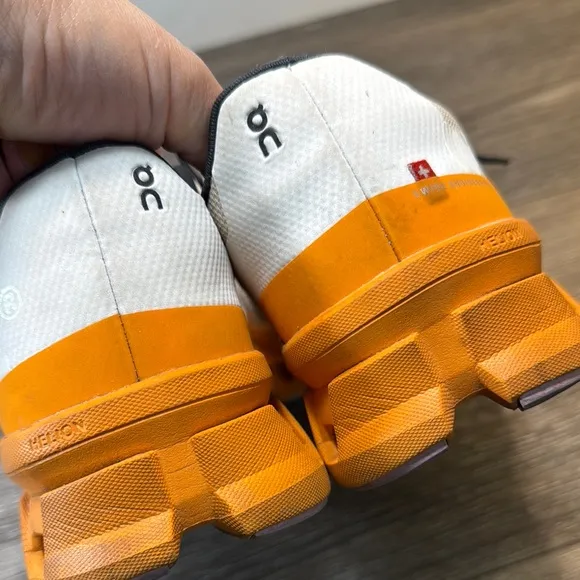On Running Shoes with Orange Accents woman’s size 9.5 (b43)
