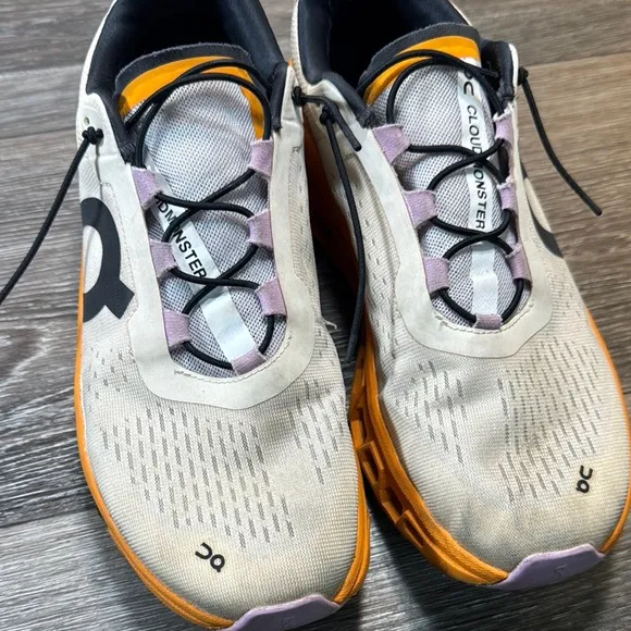 On Running Shoes with Orange Accents woman’s size 9.5 (b43)
