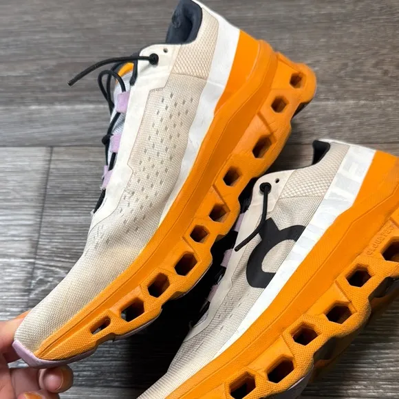 On Running Shoes with Orange Accents woman’s size 9.5 (b43)