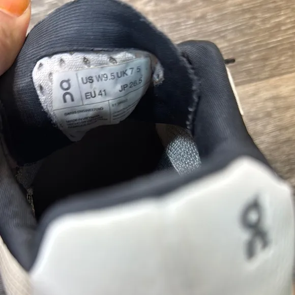 On Running Shoes with Orange Accents woman’s size 9.5 (b43)