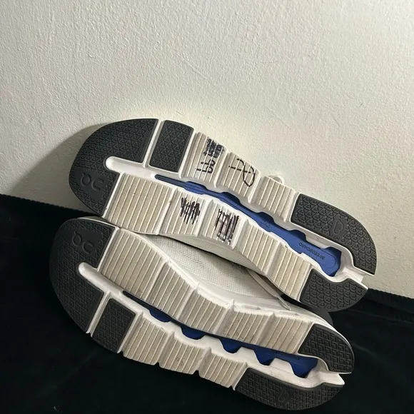 On Running White and Black Sneakers with Minimalist Design Sz 10.5