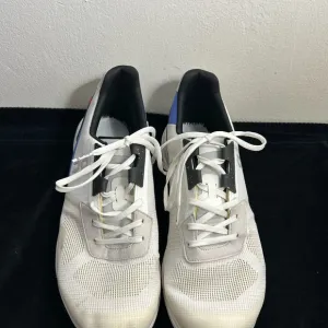 On Running White and Black Sneakers with Minimalist Design Sz 10.5