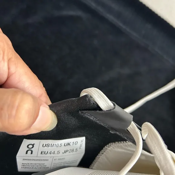 On Running White and Black Sneakers with Minimalist Design Sz 10.5