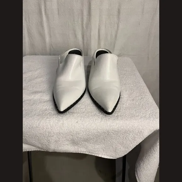 Treasure and Bond Size 9M Miles with heels and silver dot design