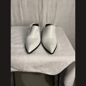 Treasure and Bond Size 9M Miles with heels and silver dot design