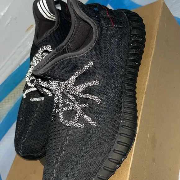Yeezy Black and White Athletic Shoes