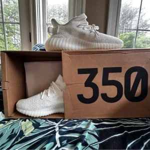 Yeezy White Athletic Shoes with Knit Upper